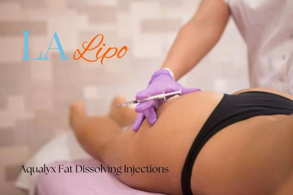 Woman having fat dissolving injections Barnet on thighs