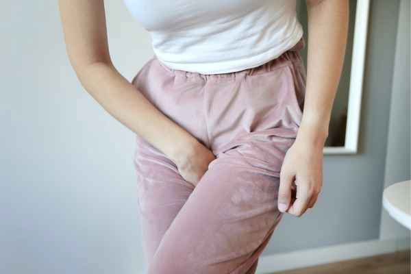 older woman running to the toilet because of urinary incontinence Barnet