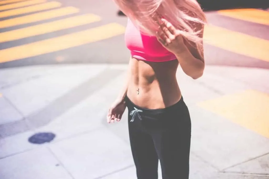 Woman with toned stomach after LA-EMS Body Sculpting Treatment Barnet